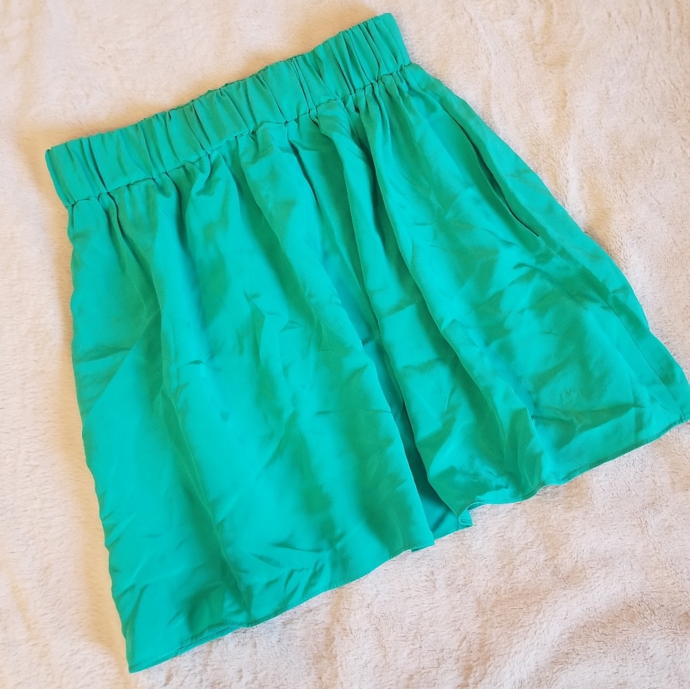 Green silk skirt